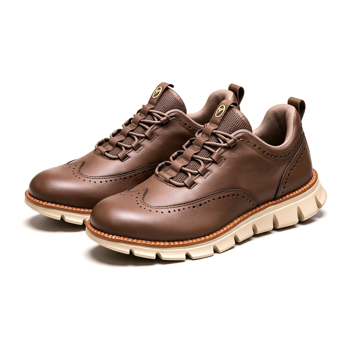 Pemberton wingtip sneakers in Brown, the pair