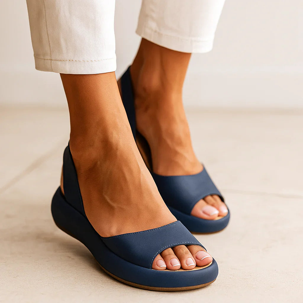 5. An open two-strap design that lets your feet breathe and swell freely