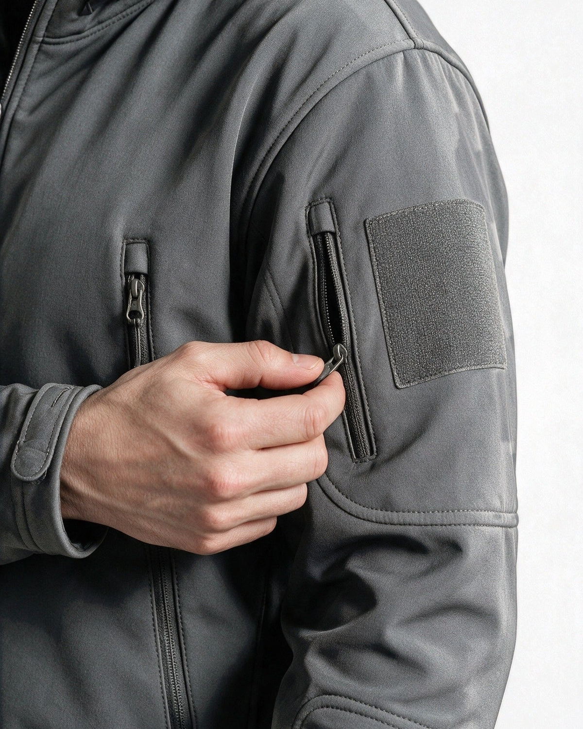 Braddock zip pockets on the arm and chest, close-up